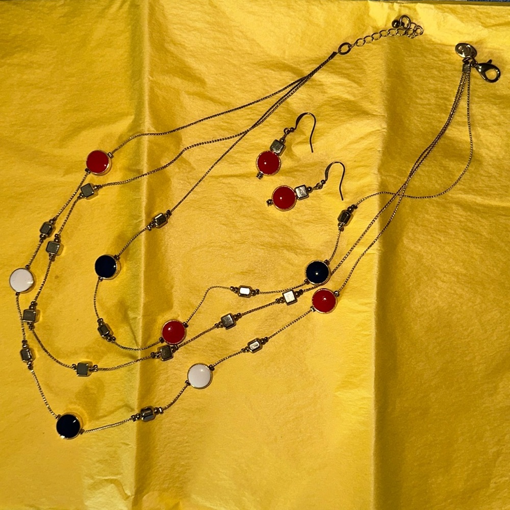 Tiered necklace set from charming Charlie gold with red white and blue circles